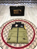 The North Face Puffer Vest in Olive Green and Black with Stand Collar